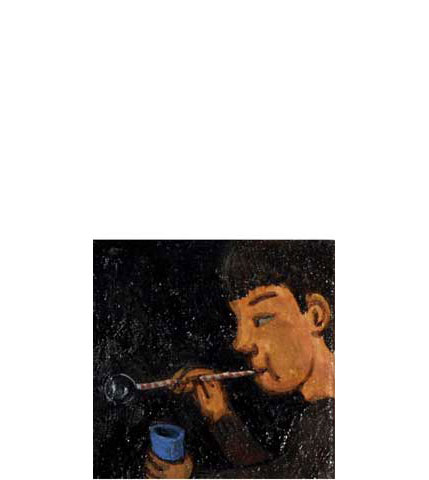 A boy blowing soap bubbles